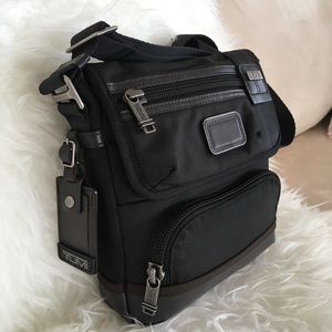 NWT Tumi Black Crossbody multi pocket Travel Bag